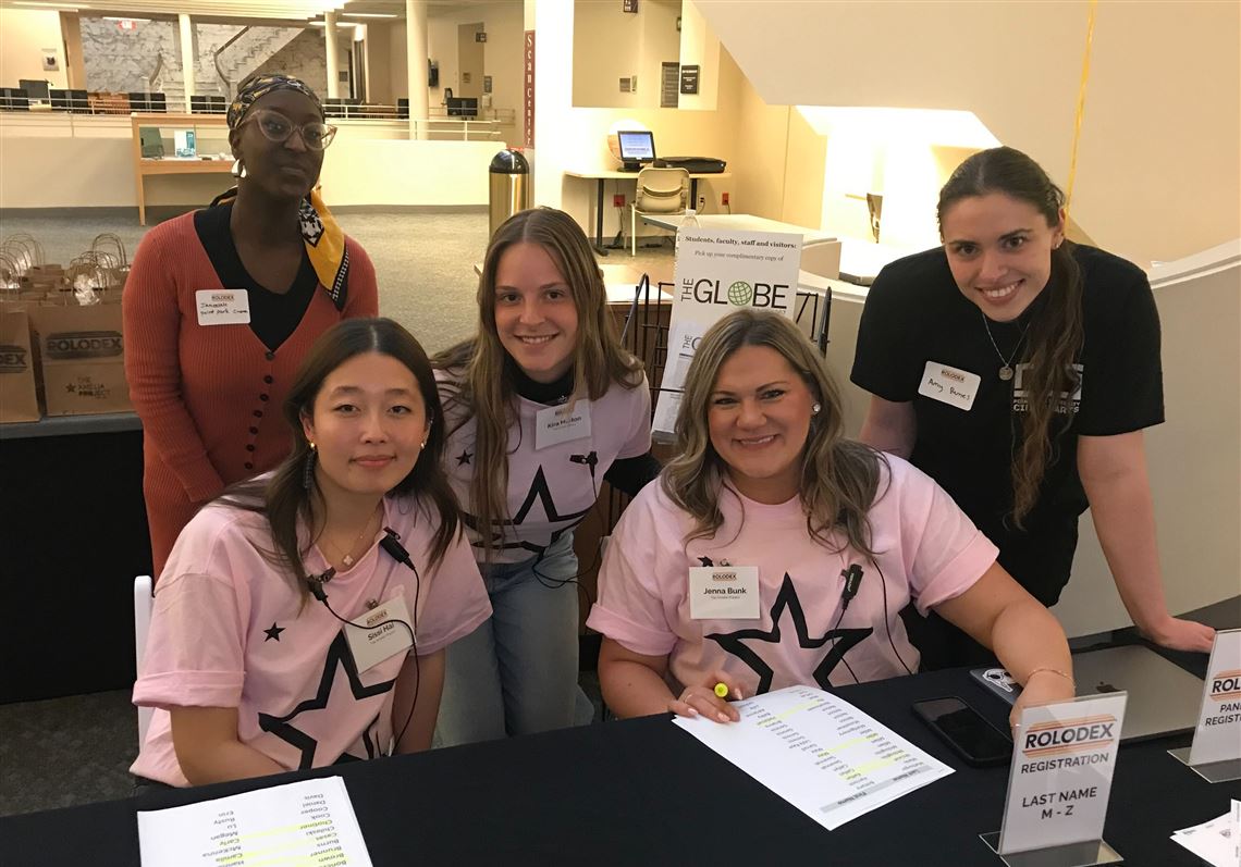 From left: Point Park University cinema arts student Jameelah Platt; University of Pittsburgh sophomore Sissi Hai; Duquesne University senior Kira Hutton; Flying Scooter Productions marketing manager Jenna Bunk; and Point Park cinema arts student Amy Remes help out during last month's Rolodex networking event on Point Park's Downtown campus.